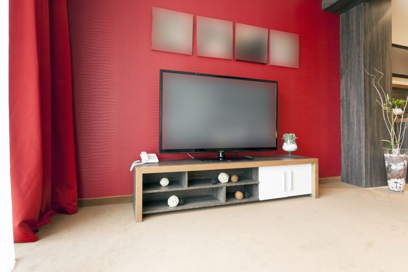 https://www.gettyimages.com/detail/photo/big-tv-in-modern-apartment-royalty-free-image/502274705?adppopup=true